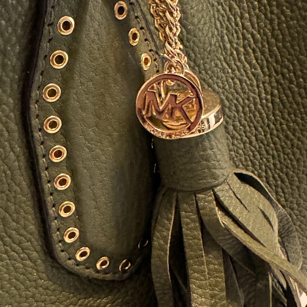Michael Kors olive colored leather handbag.
